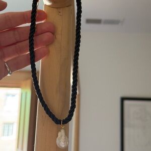 Large pearl black cord necklace